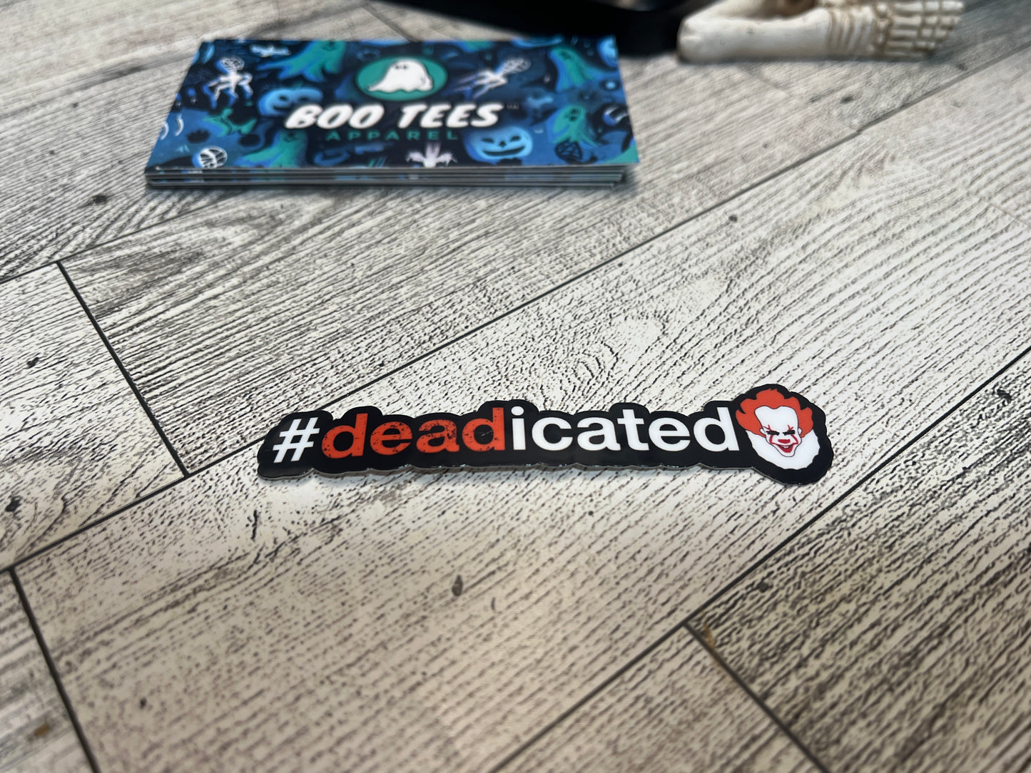 #Deadicated horror movie sticker featuring Pennywise in orange