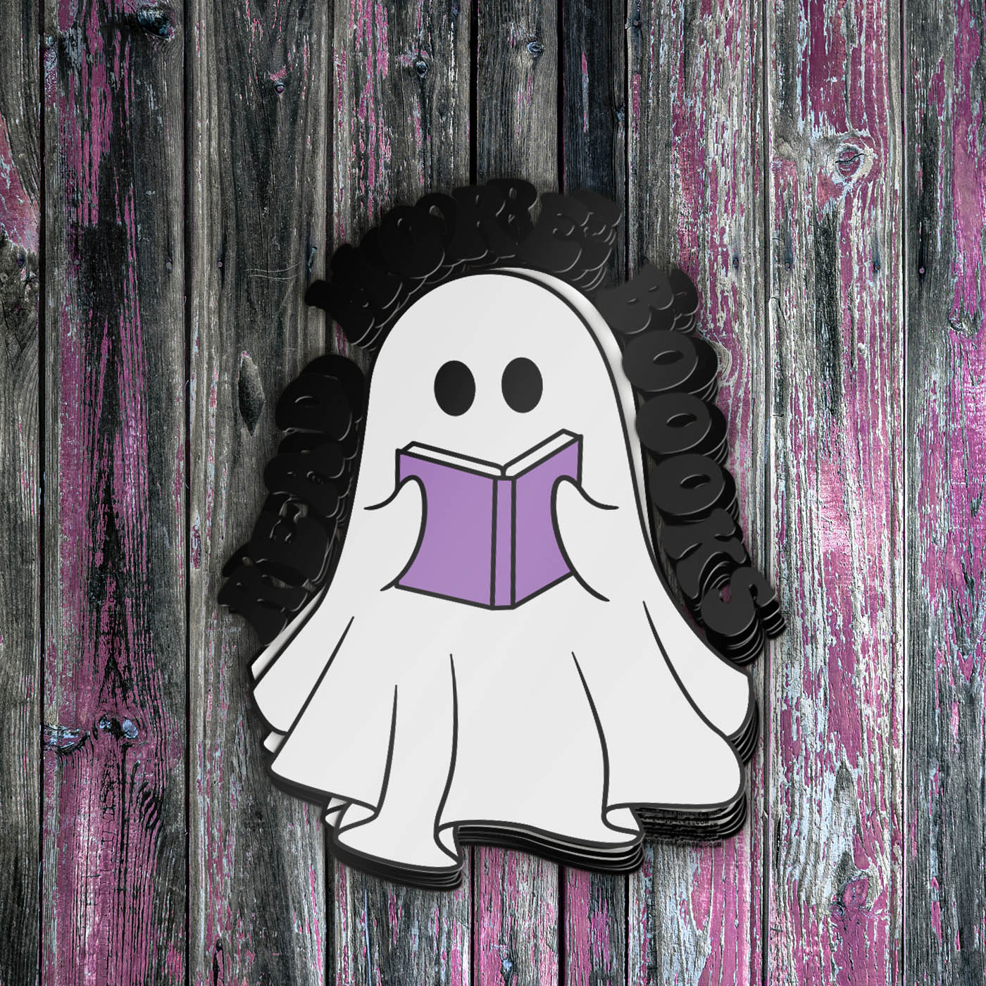 Stack of stickers featuring cute ghost reading a purple book with caption "Read More Boooks"